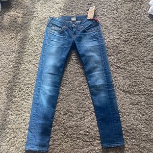 Size 28 True Religion Jeans with tags on still never worn. closet clean out !!!
